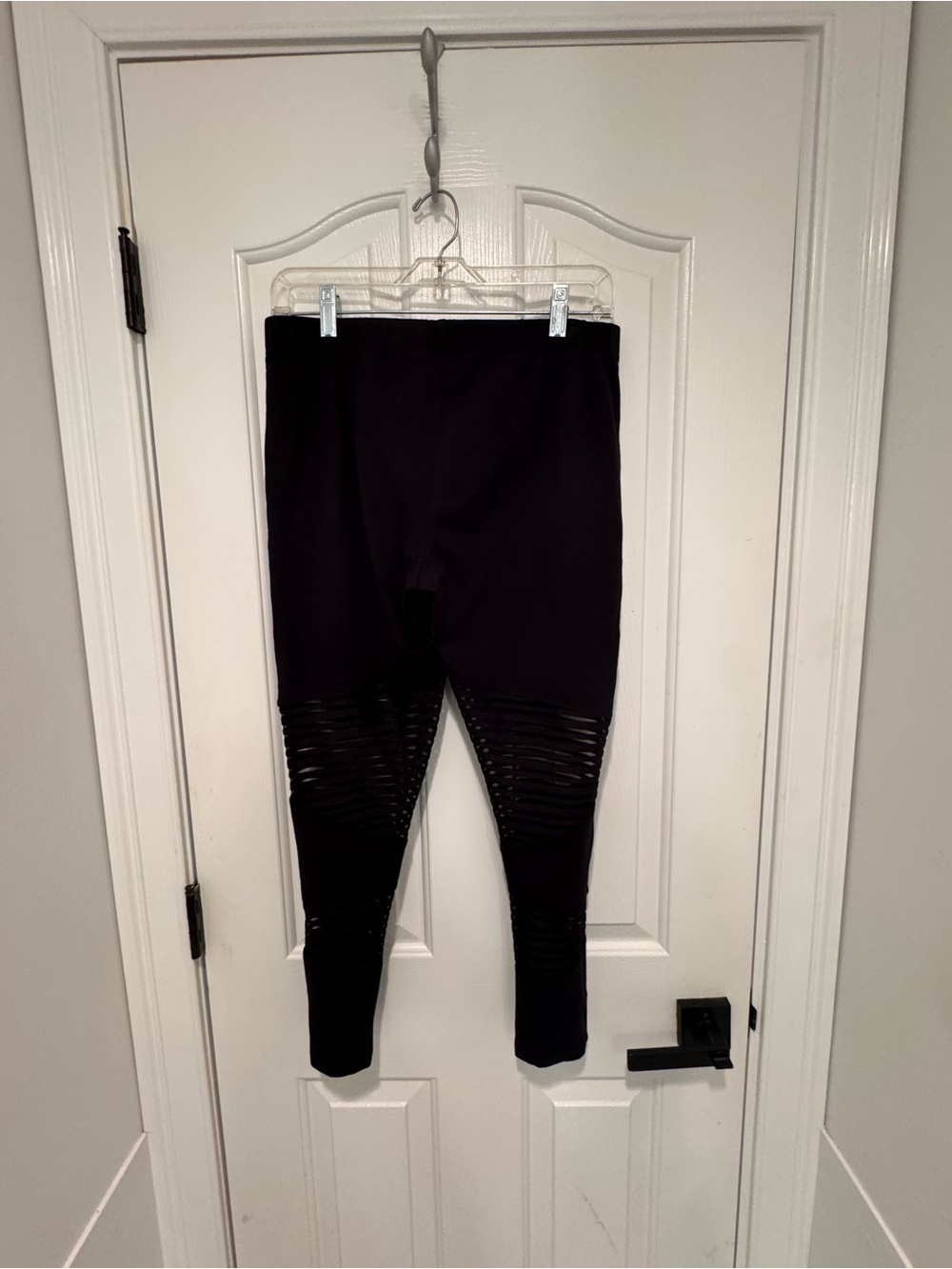 Torrid Black Leggings with striped mesh panels.